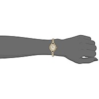 Guess Petite Vintage Inspired Gold-Tone Crystal Bracelet Watch With Self-Adjustable Links. Color: Gold-Tone (Model: U0135L2)