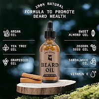 Striking Viking Scented Beard Oil Conditioner For Men Natural Organic Formula With Tea Tree Argan And Jojoba Oils Softens